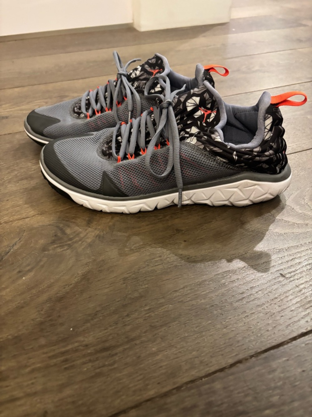 Jordan Low Top Sneaker in Gray with orange and black Accents size 9.5 men’s